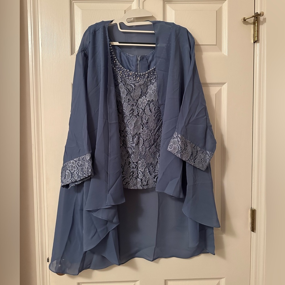 Dark blue women’s pantsuit. Size 26. Never worn.